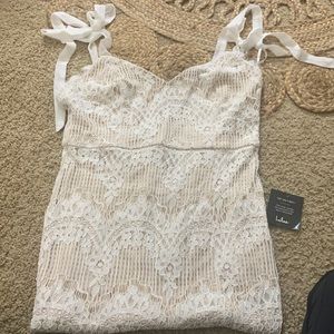 Lulus new with tag white lace dress. Size extra large.
